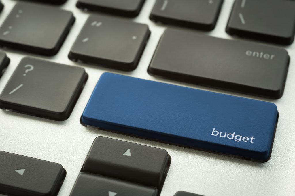 Laptop keyboard with typographic BUDGET button