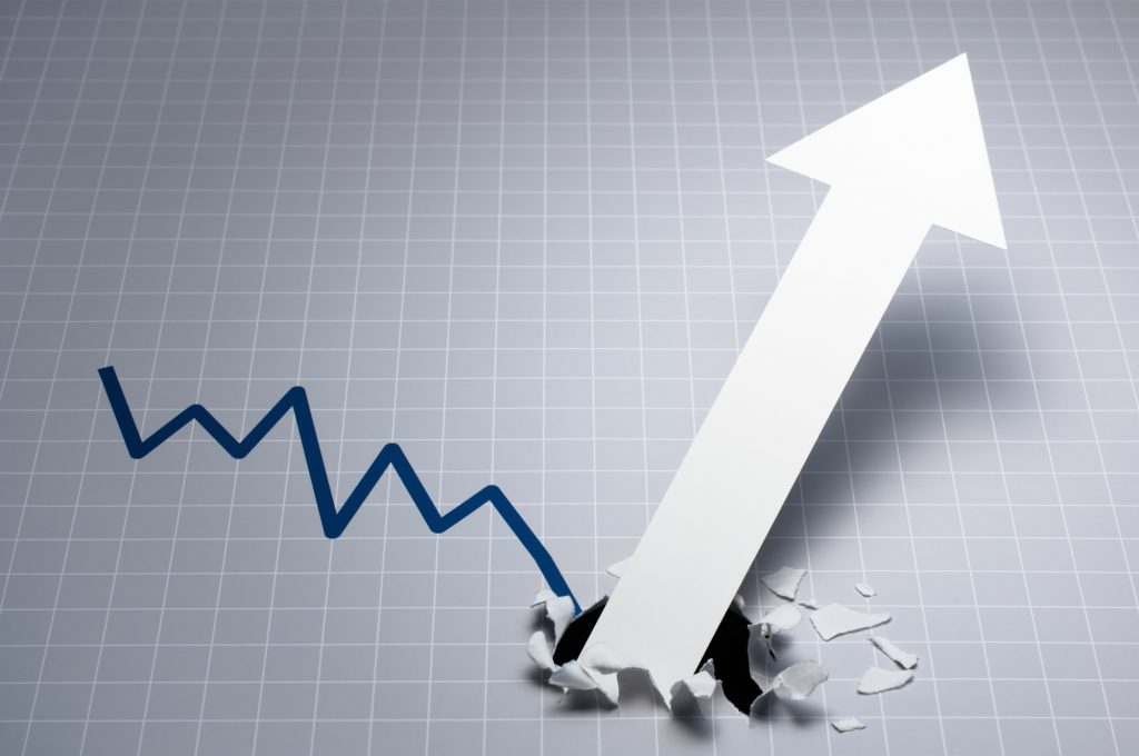 Gray line chart and white large arrow.